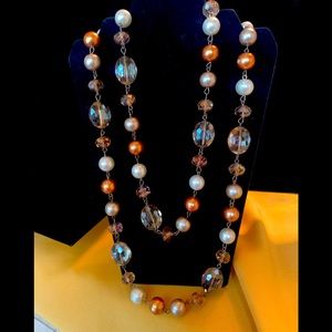 Long gold and pearl statement necklace